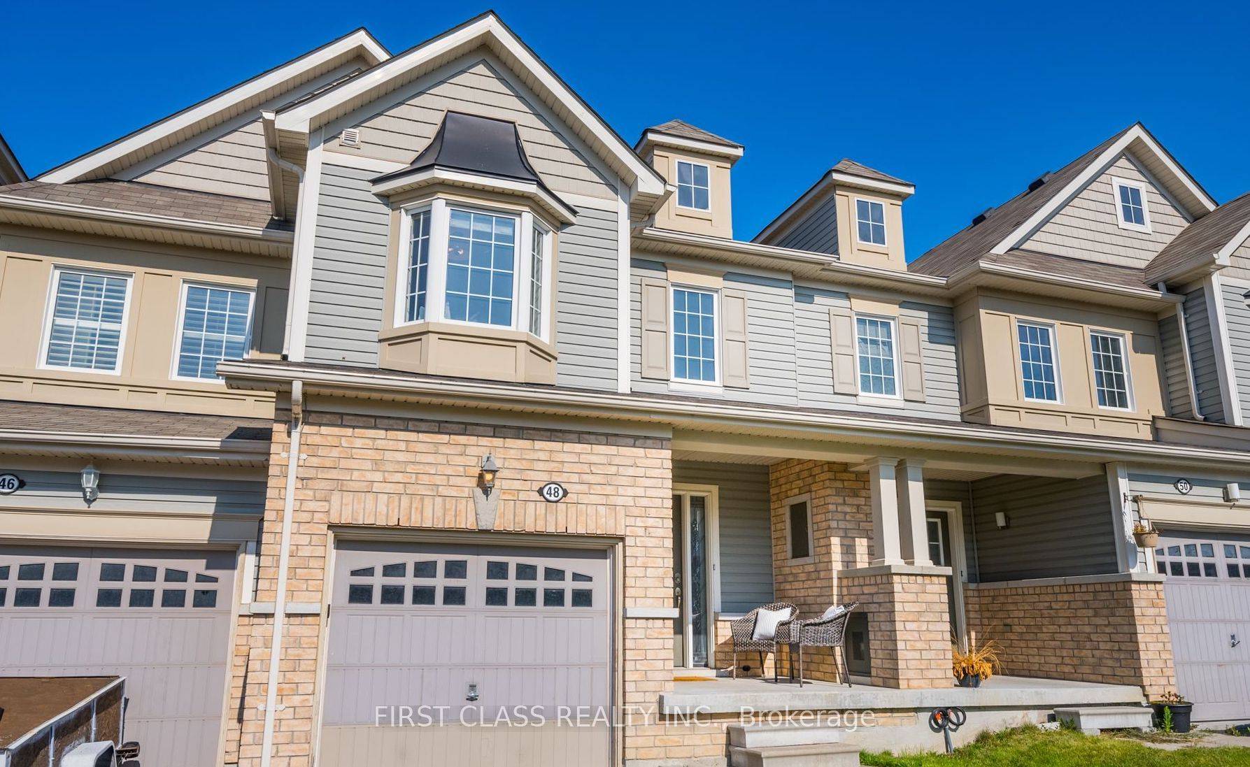 Rarely offered a spacious two floor townhome in the heart of the Blue Grass Meadows community.