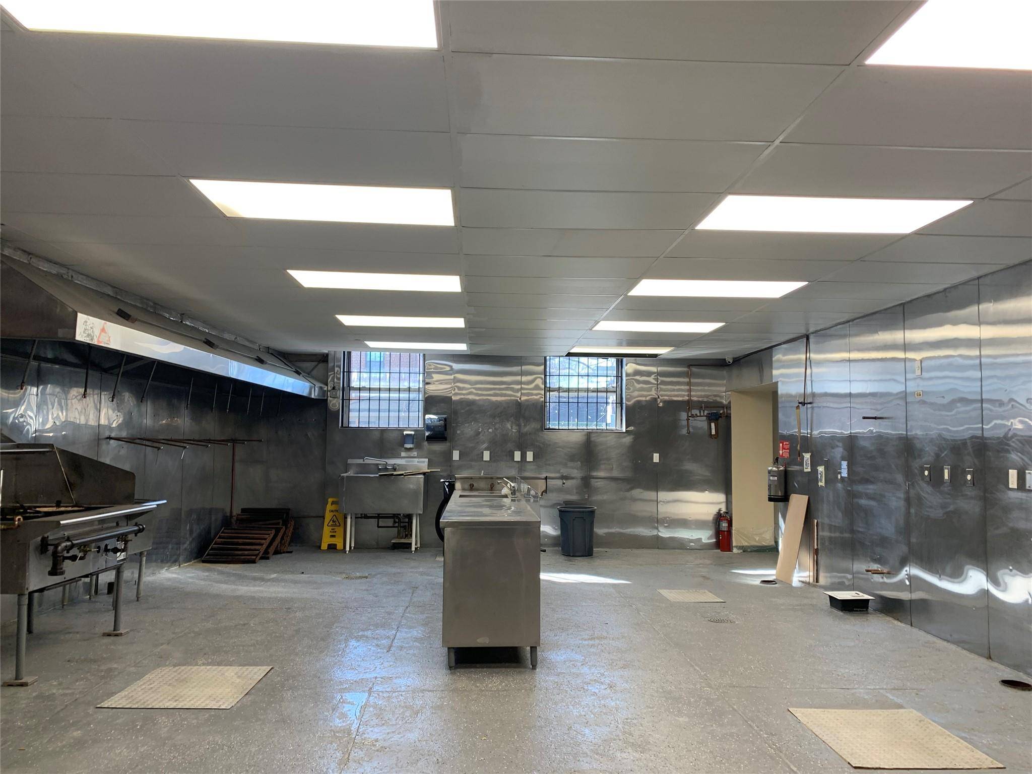 Huge commercial kitchen space with walk in boxes, vented and gas ready.