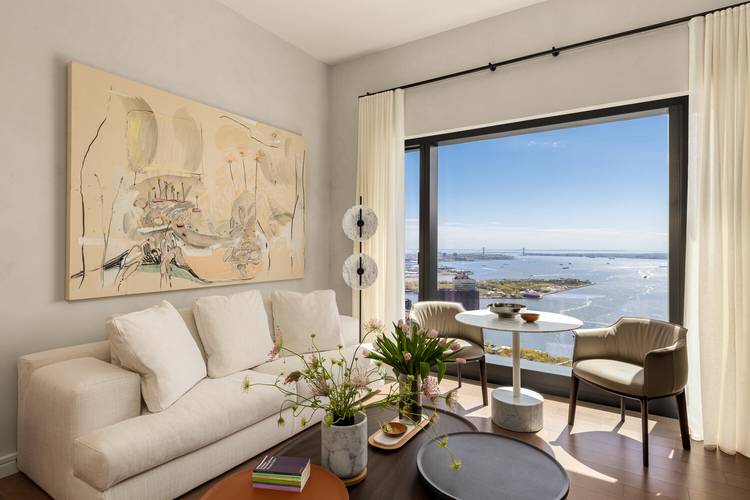 Residence 73C at The Greenwich by Rafael Vinoly is a high floor studio showcasing magnificent southern exposures and views of the New York Harbor and the Verrazano Bridge.