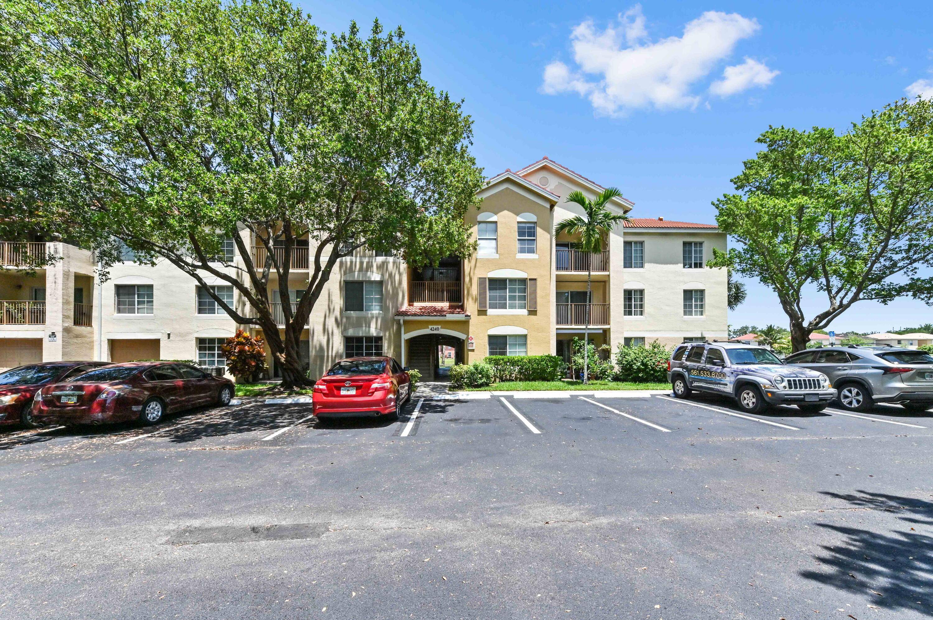 Welcome to Emerald Isle, where comfort meets convenience in this beautifully maintained first floor corner condo with serene lake views.