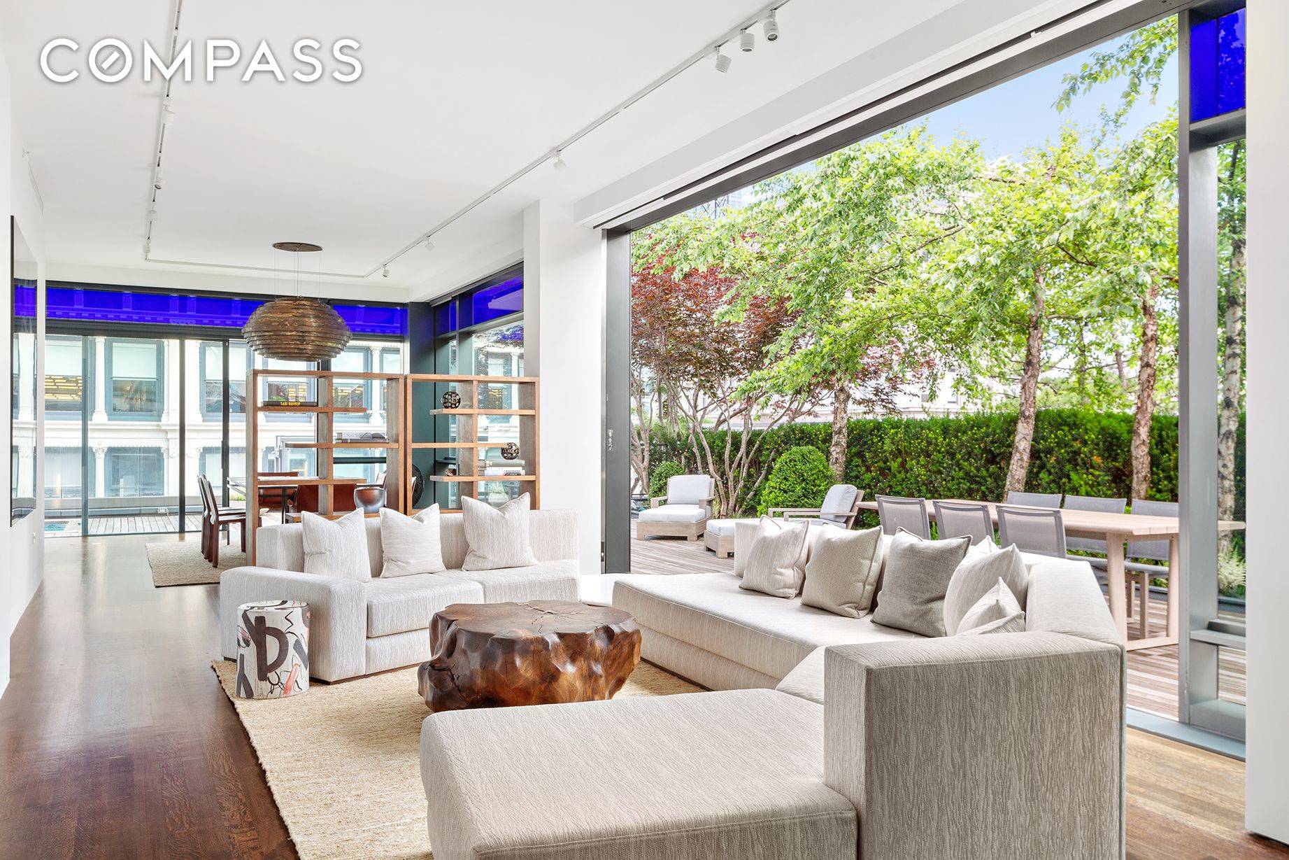 A private landscaped park with a pool right off your living room in the heart of Soho.