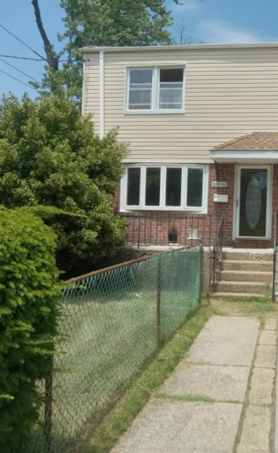 Ready for its New Owner. This corner property is Freshly painted with beautiful hardwood floors and a fully finished basement.