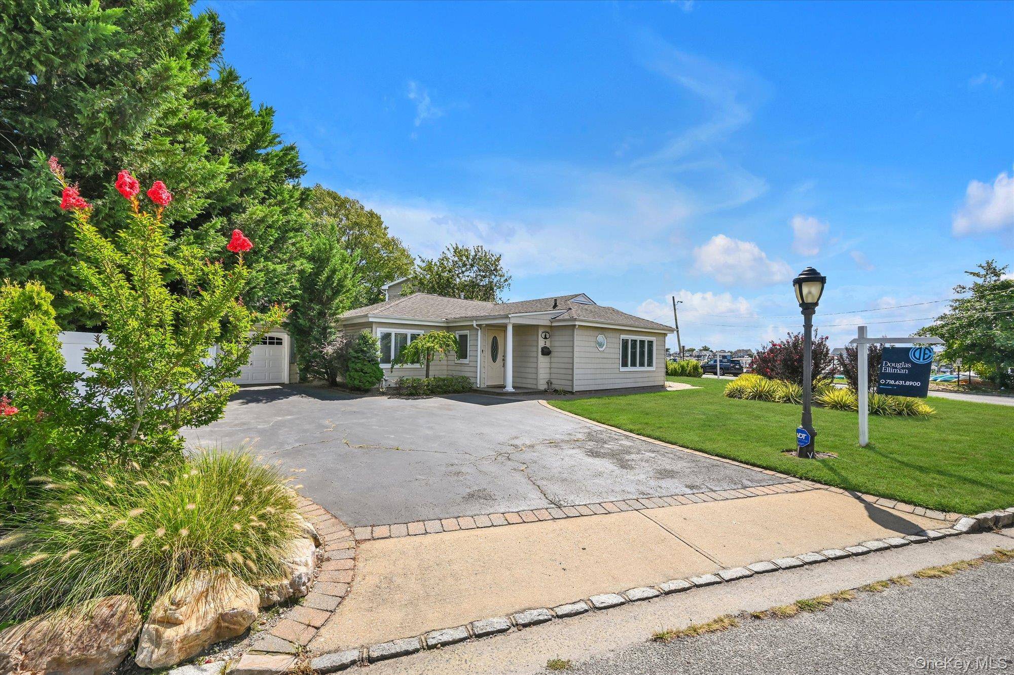 Welcome to this immaculate corner ranch home with water view, offering 3 generously sized bedrooms and 2 renovated bathrooms in a bright, open layout.