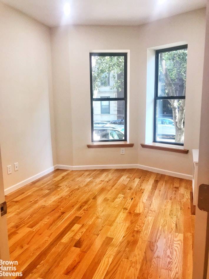 Move right in to this centrally located two bedroom plus convertible den home.