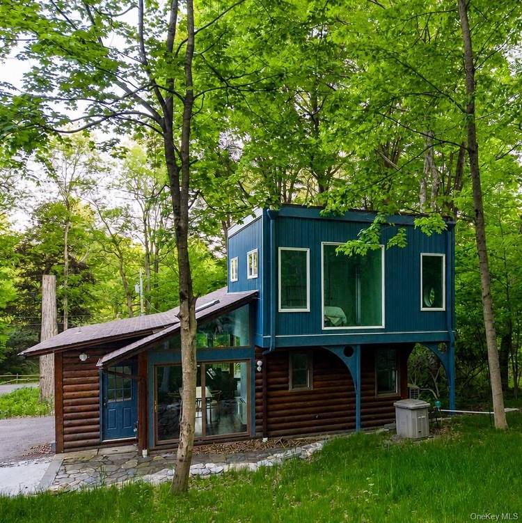 Tucked inside the coveted private community of Roaring Brook Lake, this beautifully updated 2 bedroom, 1 bath cabin is offered fully furnished for the summer season.