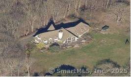 Inspiring country home. Inground pool, tennis court and equestrian features.