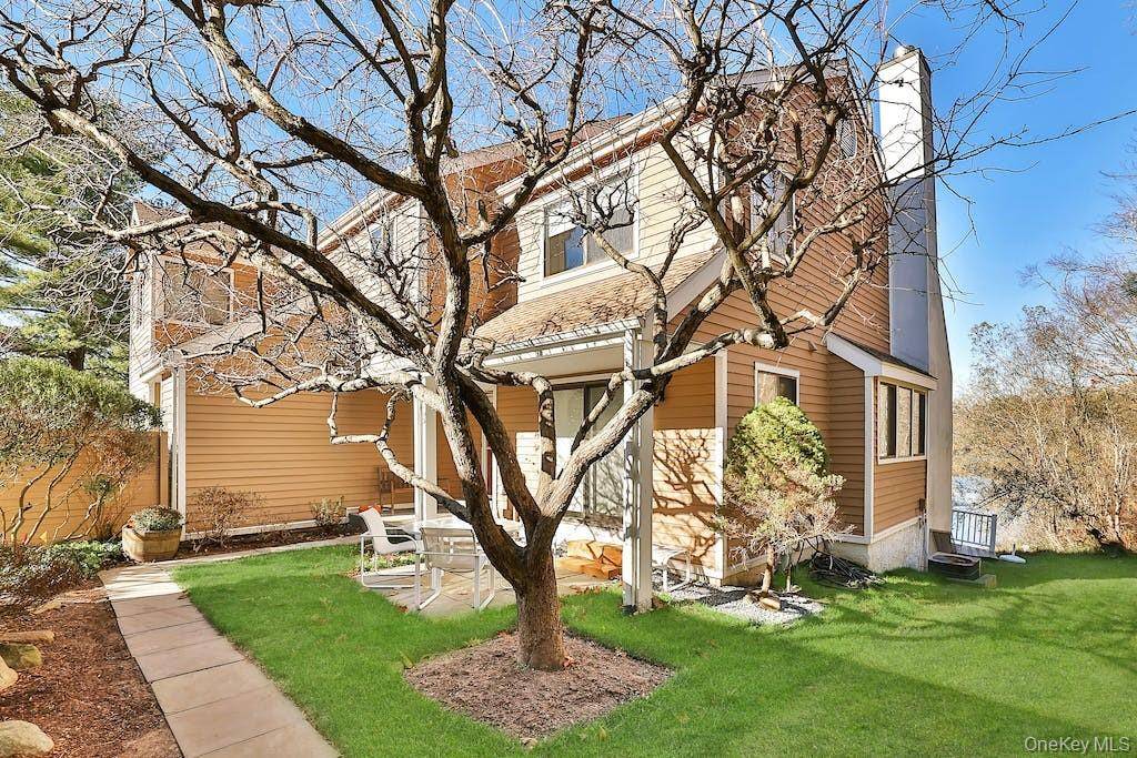 Beautifully updated townhome overlooking a picturesque lake with a private yard.