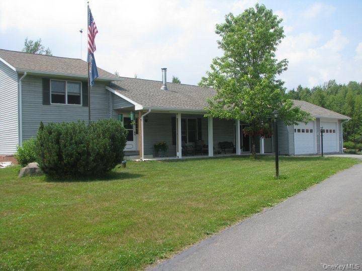 Welcome to 69 Crabby Road, a stunning single family home located in the picturesque town of Loch Sheldrake, NY.