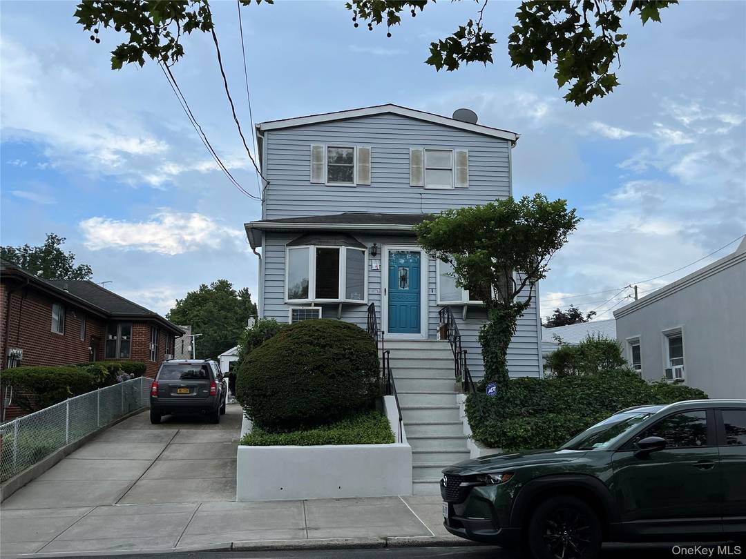 Welcome To This Classic Detached One Family Duplex Set On A Generous Lot In Highly Desirable And Sought After Middle Village !