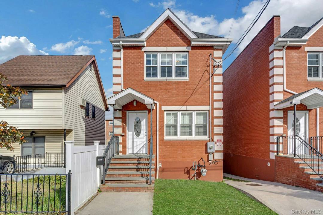 Welcome to 822 Hollywood Avenue, a beautifully maintained detached brick home nestled in the sought after Throggs Neck community.