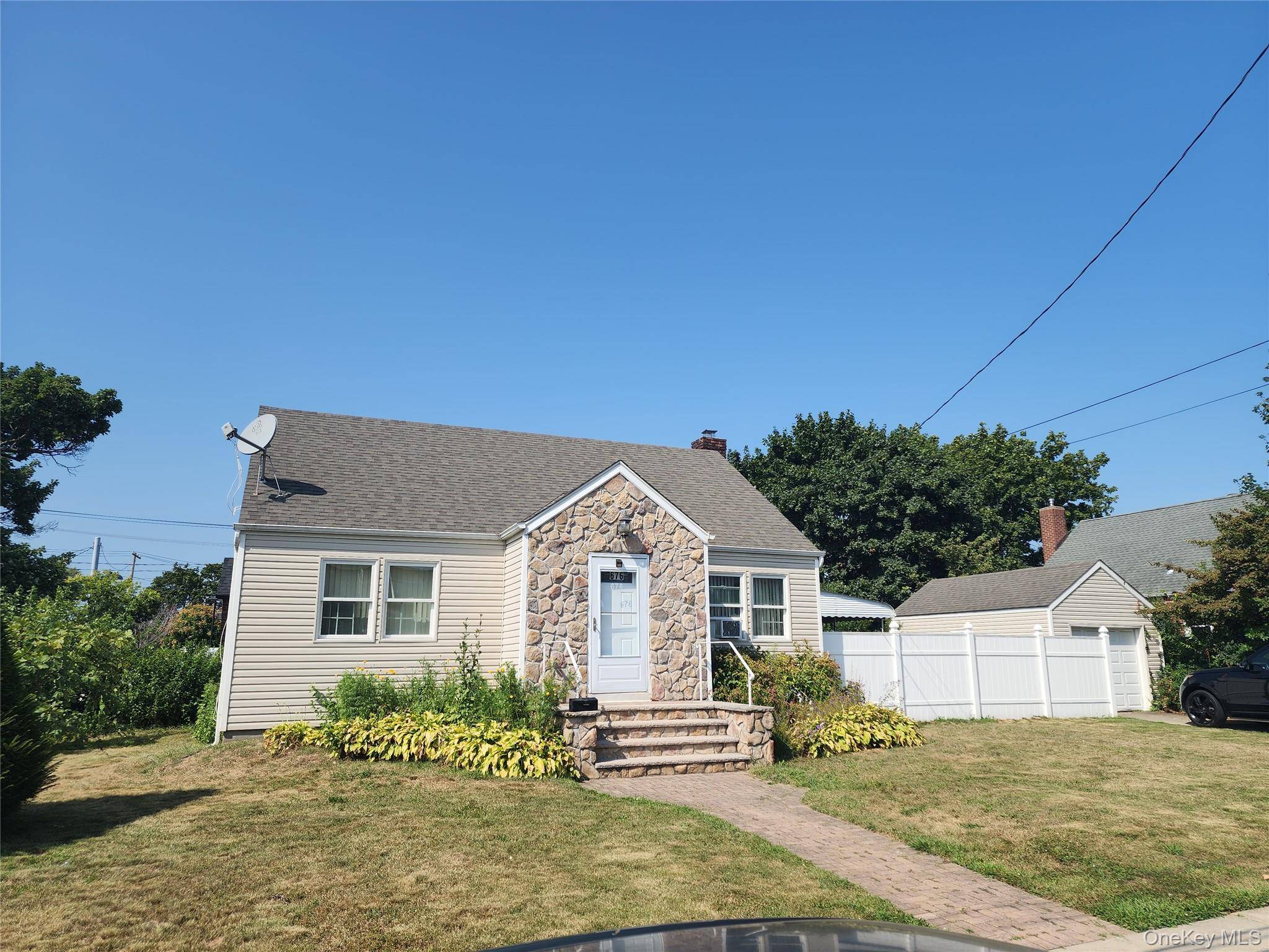 Welcome to this wide line cape Cod style home in the desirable area of Franklin Square.