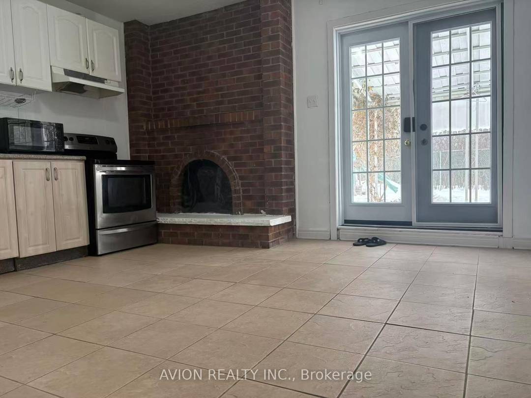 One Full Of Sunshine Bedroom With Big Size Above Ground Level Window Apartment With A Separate Entrance, Kitchen walk out to back yard.