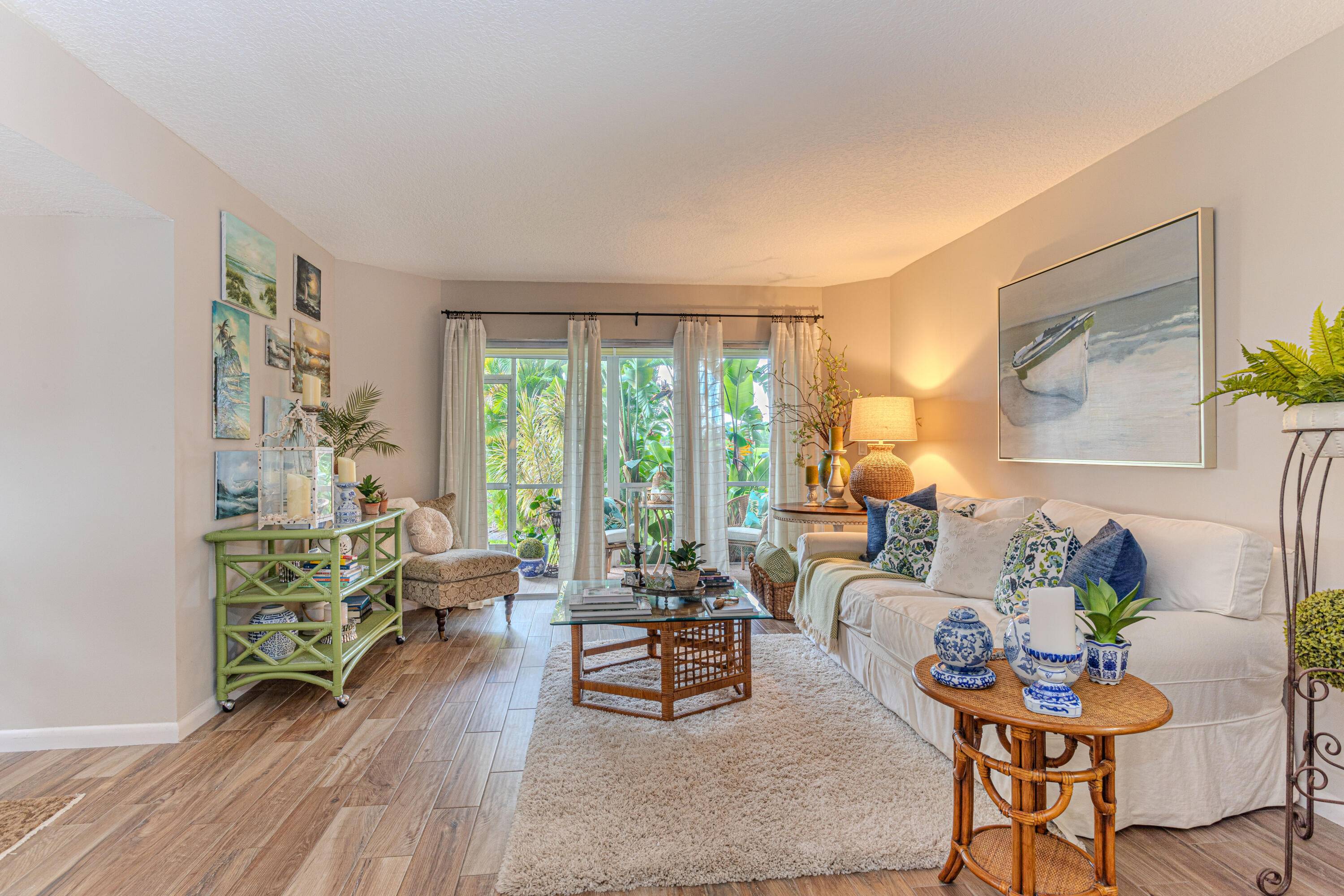 This beautifully renovated ground floor corner unit offers ultimate convenience with a dedicated parking space right outside the door.
