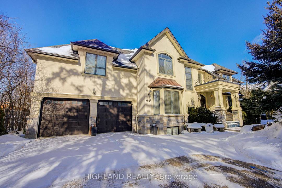 STEPS TO LAKE Distinguished custom built two storey residence offering over 5, 000 sq.