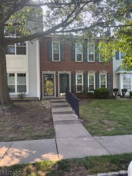 Stunning Second Floor Condo with Private Entrance and Assigned Parking Walk into the Living Room with Vaulted Ceiling and Wood Burning Fireplace Lite Bright and Cheery Formal Dining Room opens ...