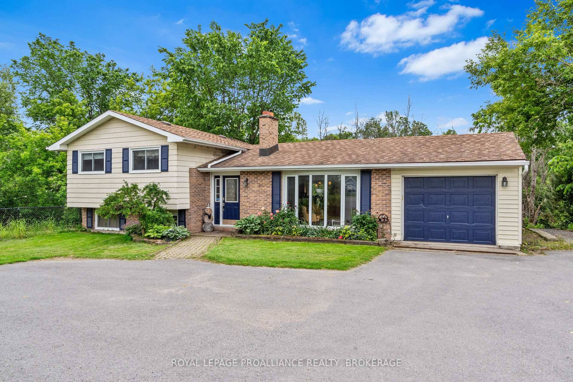 Set on just over 1 acre and backing onto the beautiful Westbrook Creek, this unique Kingston home offers a rare connection to nature right in town.