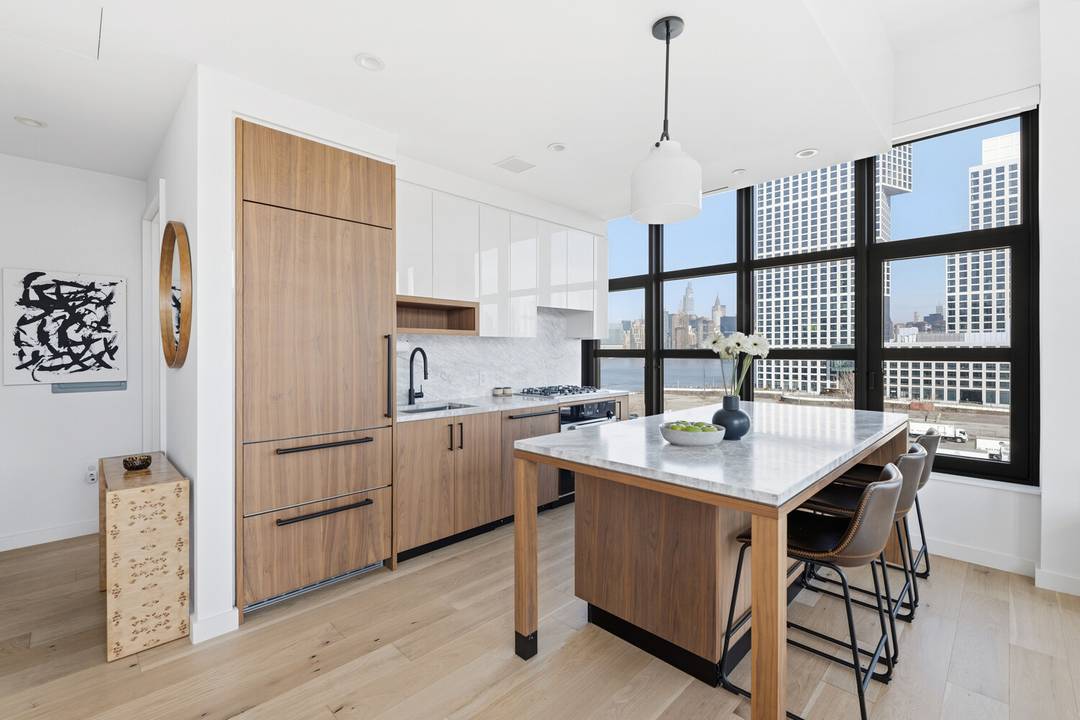 A rare offering on Greenpoint's desirable waterfront, this impeccably designed two bedroom, two bathroom corner residence offers radiant natural light, refined finishes, and access to one of Greenpoint's most impressive ...