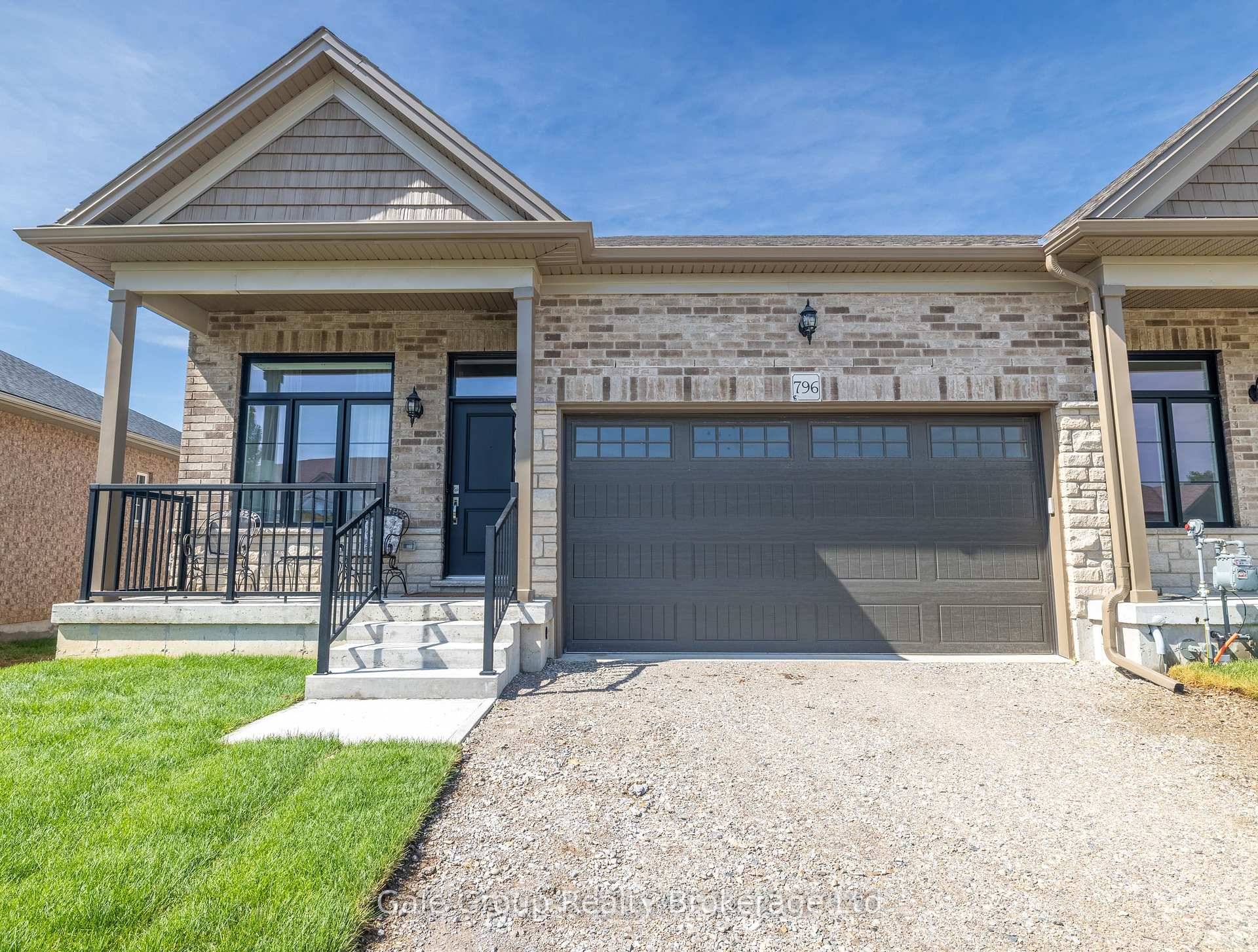 BETTER THAN NEW ! This less than 1 year old, HUGE end unit, 2 1 bedroom, 3 full bathroom, over 2000 finished sq ft, fully finished, walk out basement bungalow ...