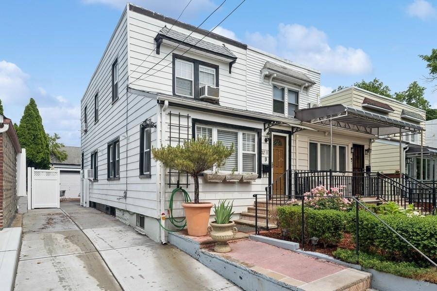 Come see this rare find in Bayside, 2 story semi detached Treasureland Duplex with a NEW 4 car privately owned driveway and huge detached garage in the Auburndale neighborhood.
