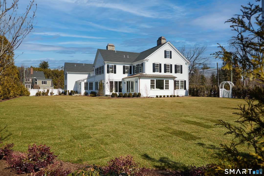 Beautiful Georgian Colonial style home in desired Greens Farms neighborhood design by renowned architect Judith Larson.