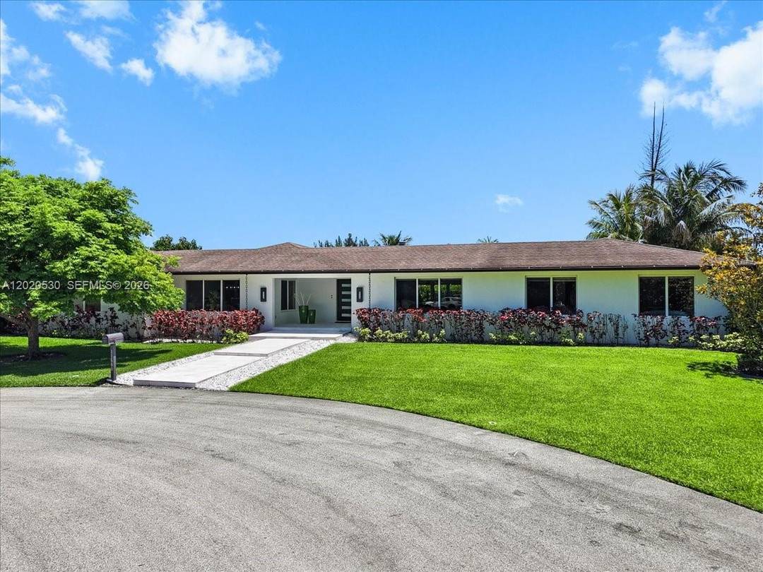 Beautifully upgraded 4 bedroom, 3 bath residence in the heart of Plantation offering luxury finishes, timeless design, and an exceptional location near American Heritage Schools.
