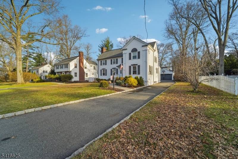Welcome to this beautifully expanded and thoughtfully renovated home set in the highly desirable St.