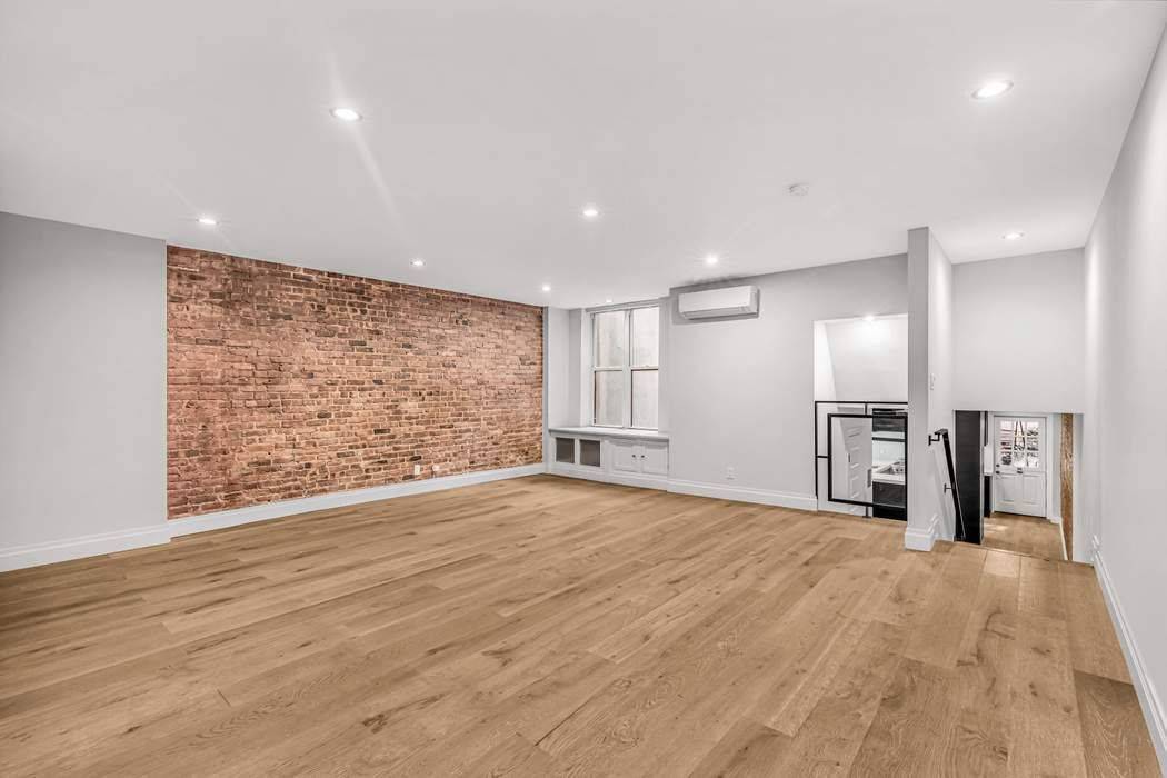 Discover a beautifully renovated sanctuary in this boutique condominium, perfectly situated just off Central Park on a charming West 70s brownstone block.