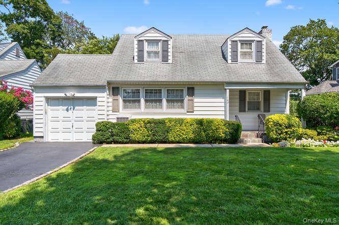 New to Market ! Welcome to this beautifully maintained home in the Garden City school district in a mid block location.