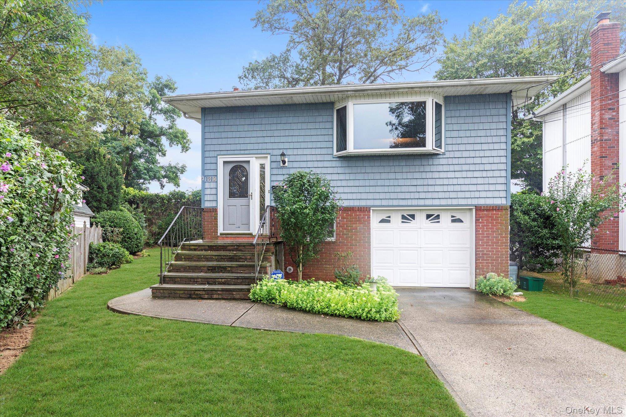 Located On A Quiet, Tree Lined, Dead End Street, This 4 Bedroom 2 Full Bath Hi Ranch Is Set On A Large Irregular Shaped Property.