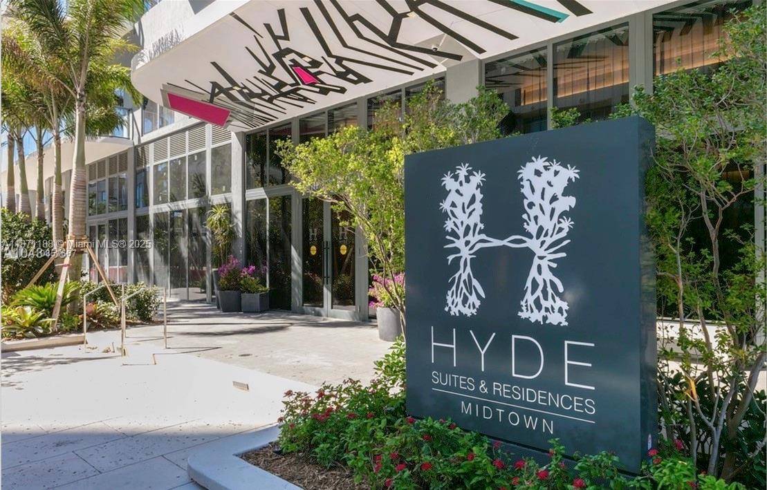 Beautiful corner residence at Hyde Midtown, 2 bedrooms, 2 bathrooms, with floor to ceiling glass and wraparound balcony offering stunning city views.