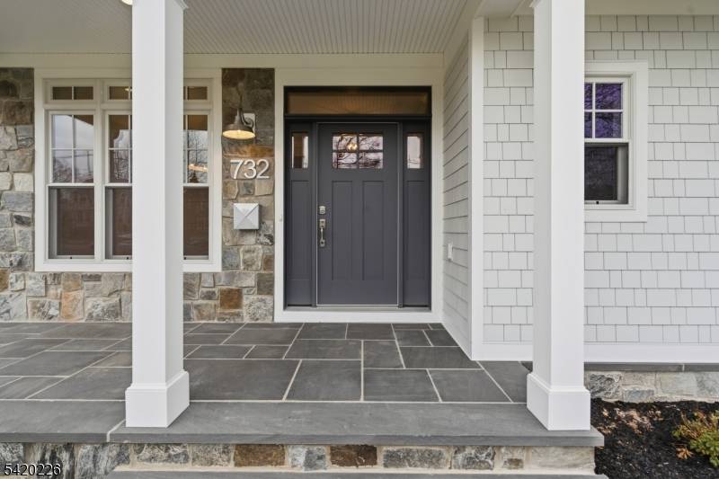 Welcome to this exceptional new construction home by Elshiekh Custom Homes, ideally located on a quiet street on the desirable North Side of Westfield, just moments from downtown.