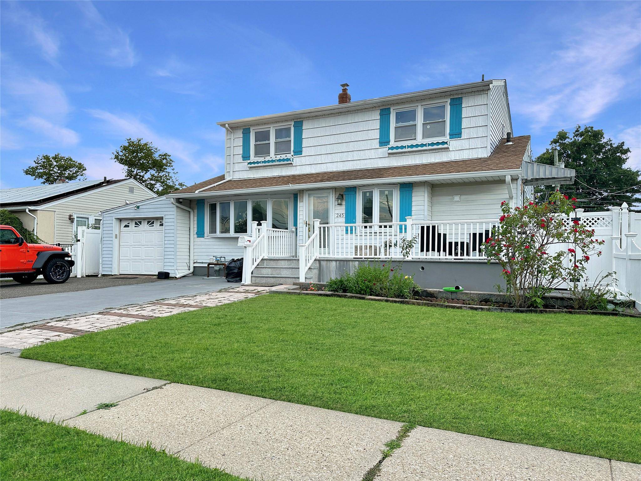 Welcome to 245 Dartmouth Drive, a spacious ranch located in the desirable Hillside Terrace neighborhood of Hicksville.