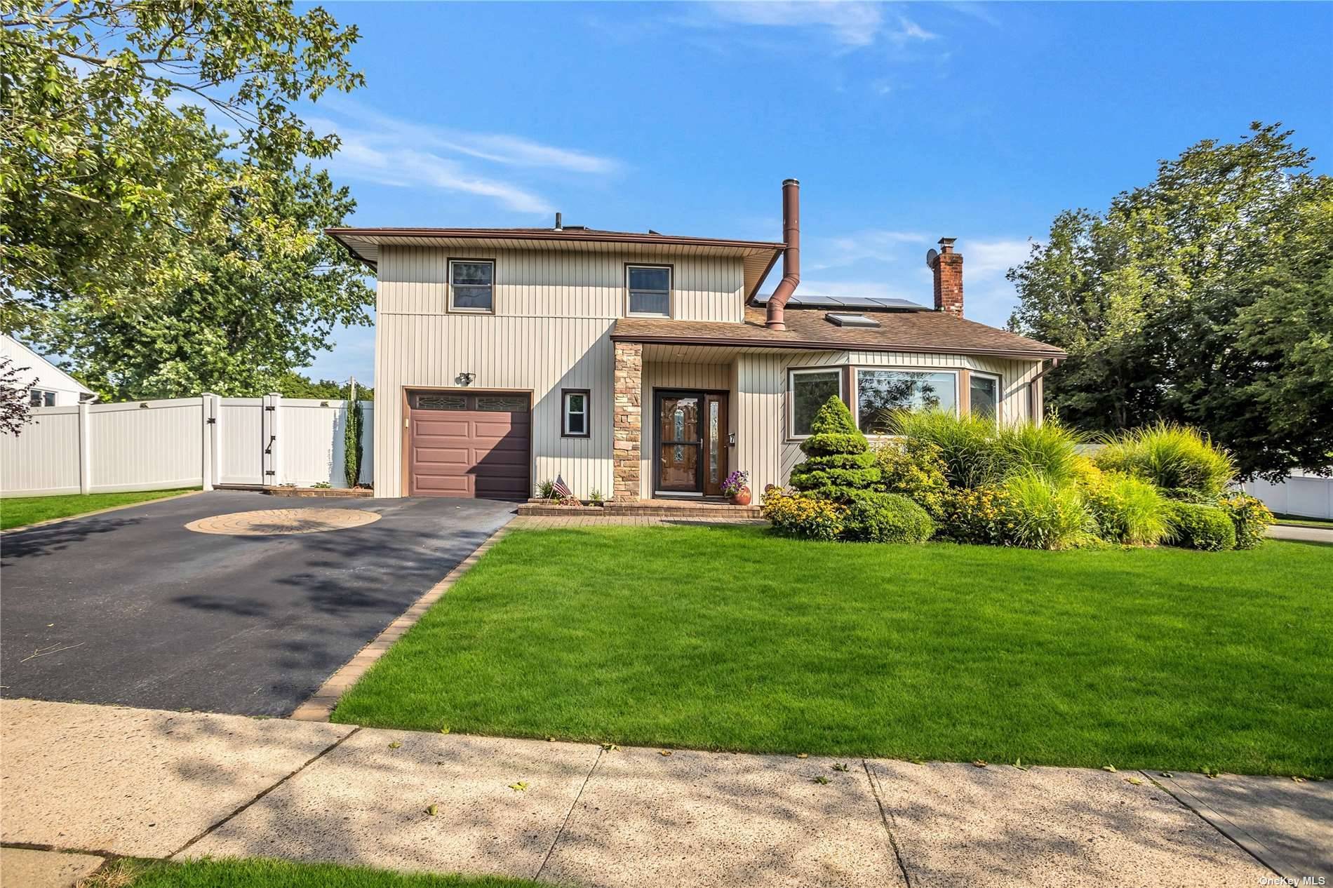 Welcome to this Unique Splanch Style Split home in the heart of Plainview.