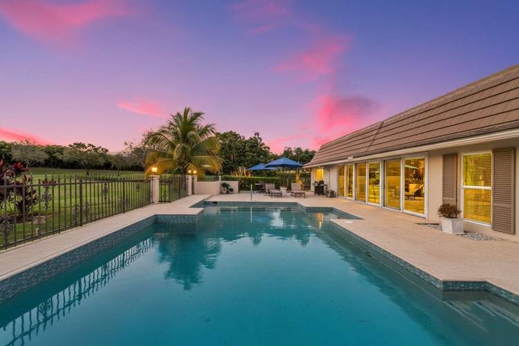 Beautifully renovated 4BR 3BA home located on the 12th hole in Delray Dunes Golf amp ; Country Club.