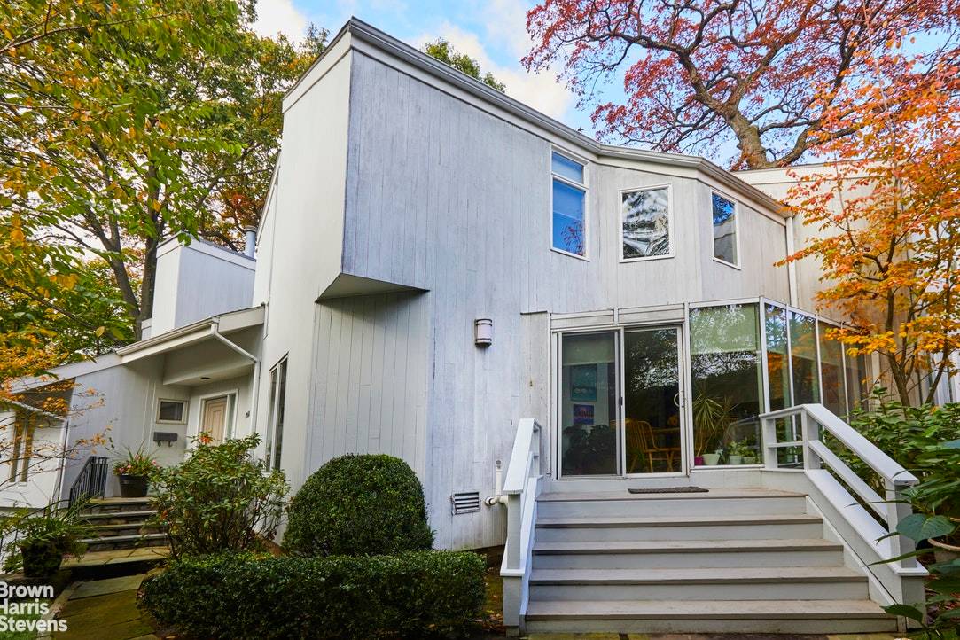 Situated in Riverdale's bucolic Estate section and just steps away from the Iconic Wave Hill, this gracious home features five bedrooms and three and a half bathrooms, white oak and ...