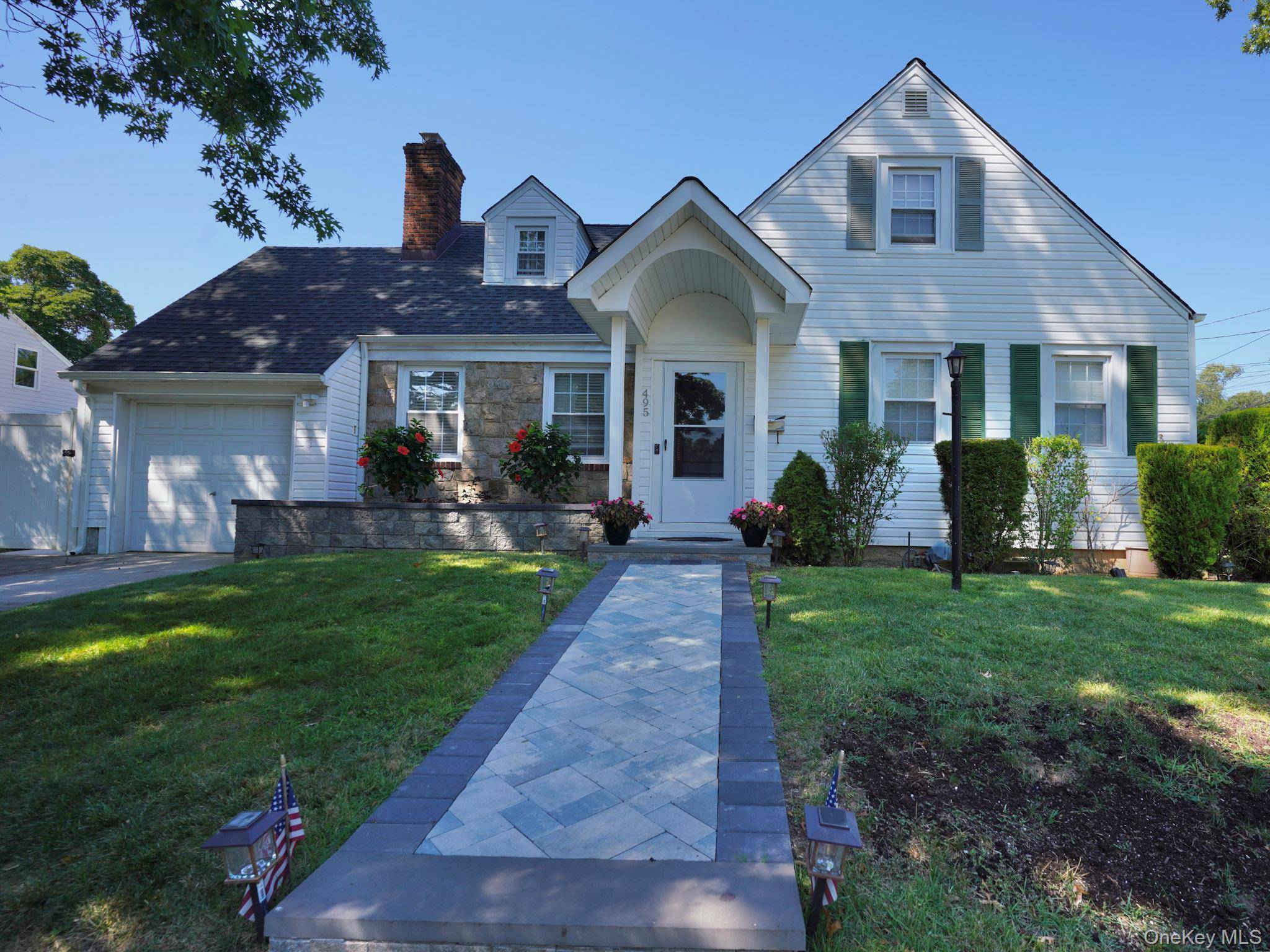 Welcome to this gorgeous cape cod styled home nestled on a picturesque, tree lined street in Baldwin.