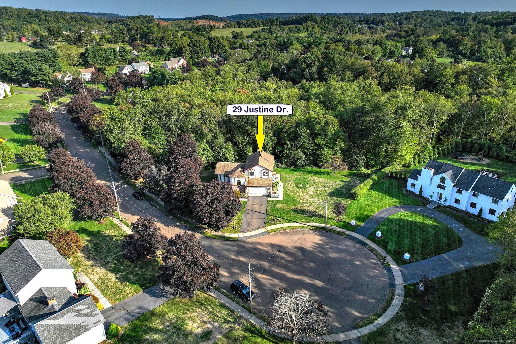 Welcome to this one owner, custom built contemporary home, meticulously maintained and set on a quiet, tree lined cul de sac.