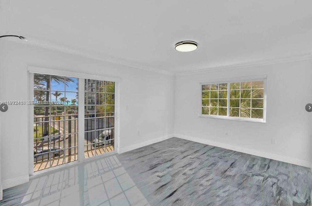 Steps from the beach in Surfside, this beautifully renovated boutique condo offers stunning ocean views from both bedrooms, impact windows, modern finishes, in unit washer dryer, and garage parking.