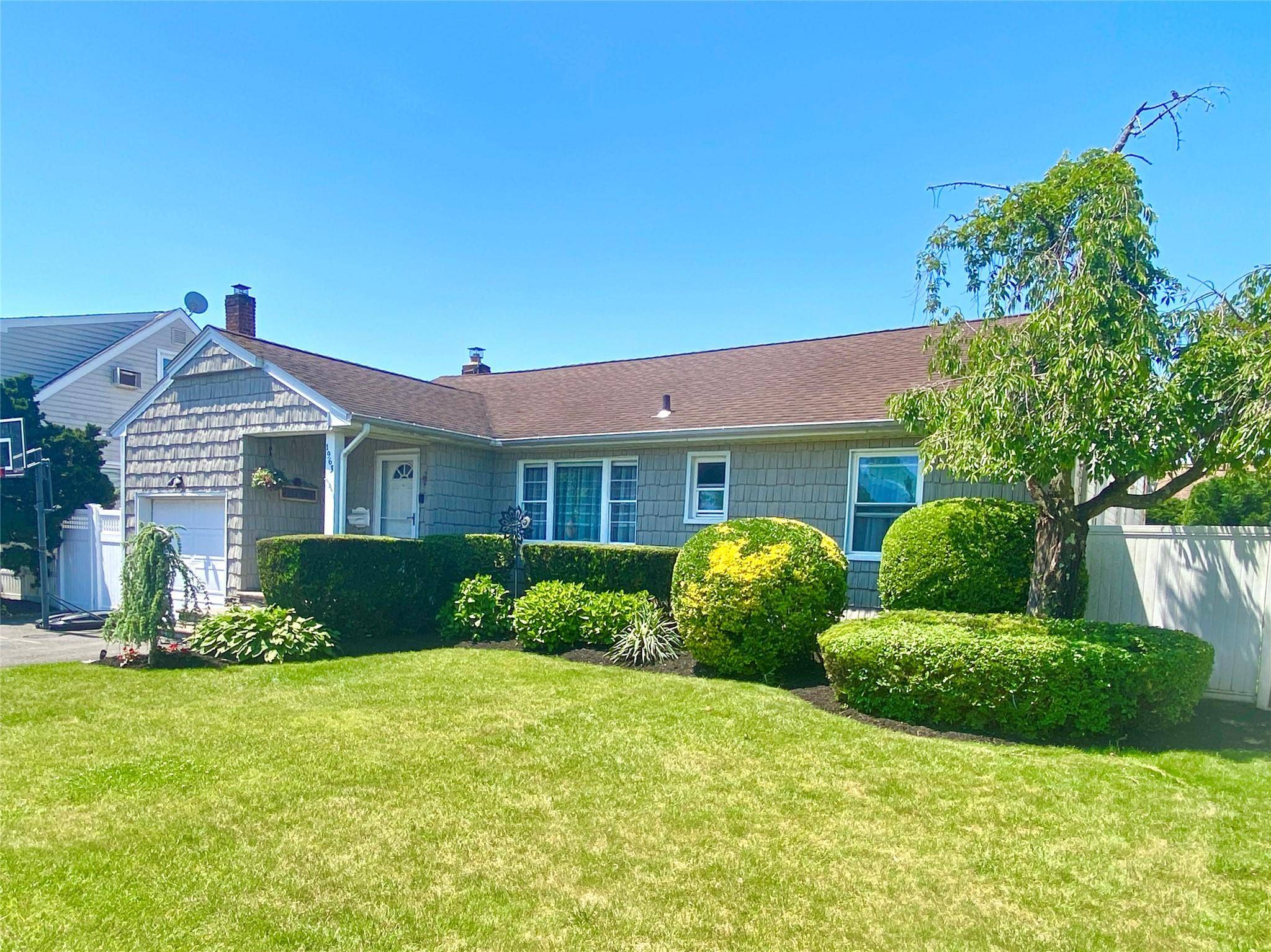Expanded Ranch Located In Highly Desirable Barnum Woods School District.