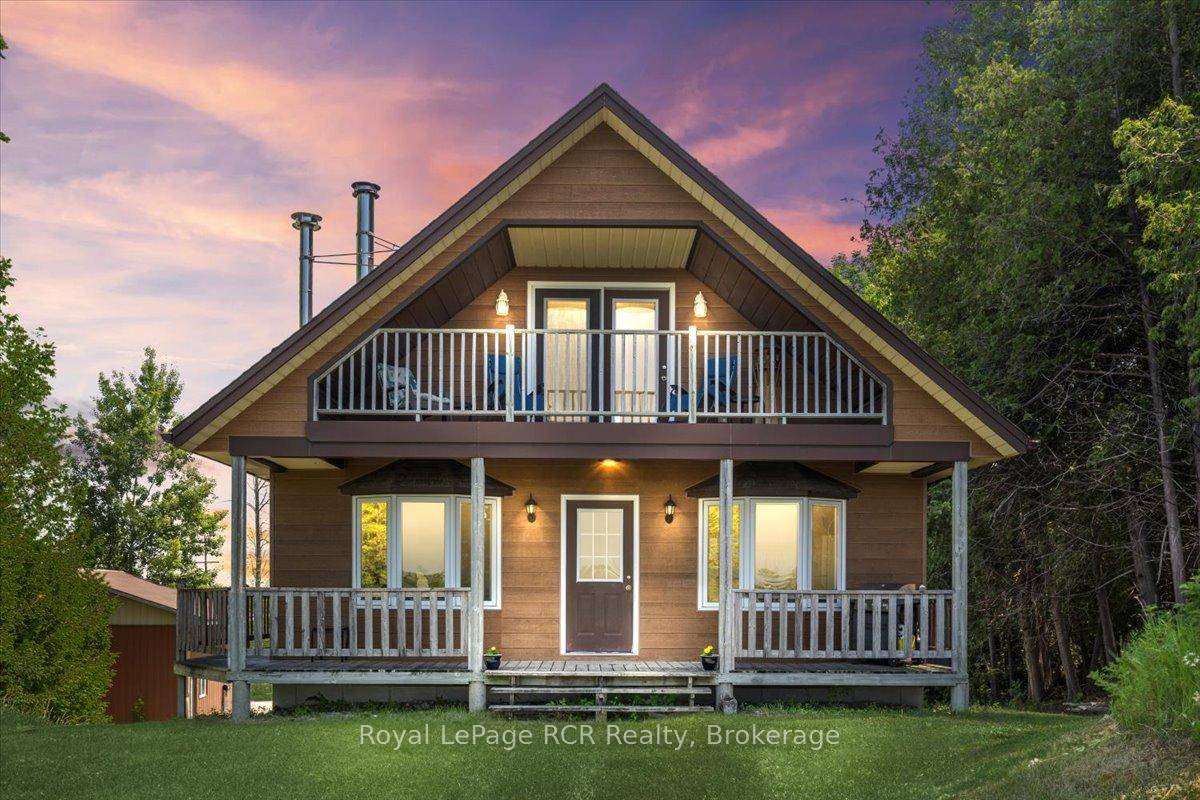 As you approach this 4. 66 acre property, you will notice a charming chalet that sit on top of a hill.