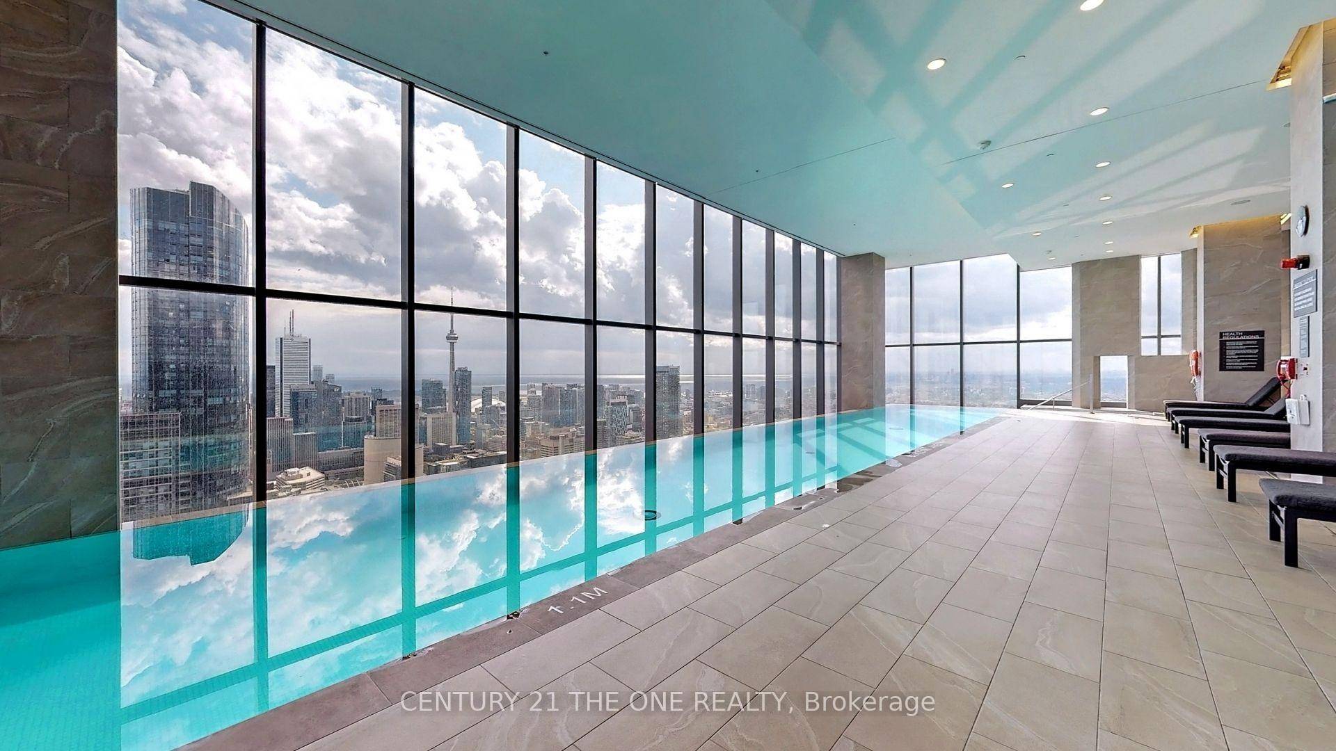 Priced To Sell. Discover urban elegance in this bright and spacious 3 bedroom, 2 bathroom condo on the 24th floor of YC Condos, located at 7 Grenville St, Toronto.
