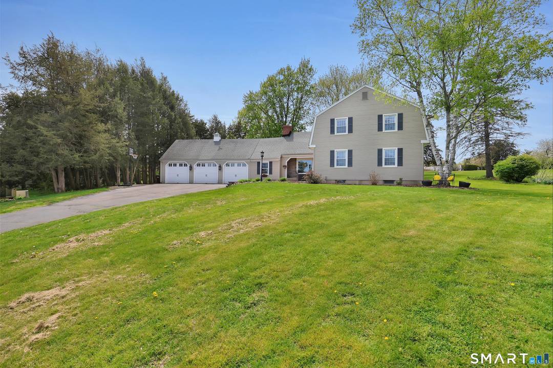 Welcome home to this inviting 10 room Colonial set on a quiet Pyquag Village cul de sac.