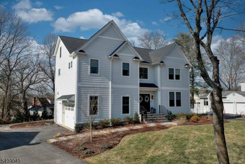 Built in 2024 by JTS Build Design and ideally situated on a quiet cul de sac in sought after Madison, this exceptional 6 bedroom, 4.