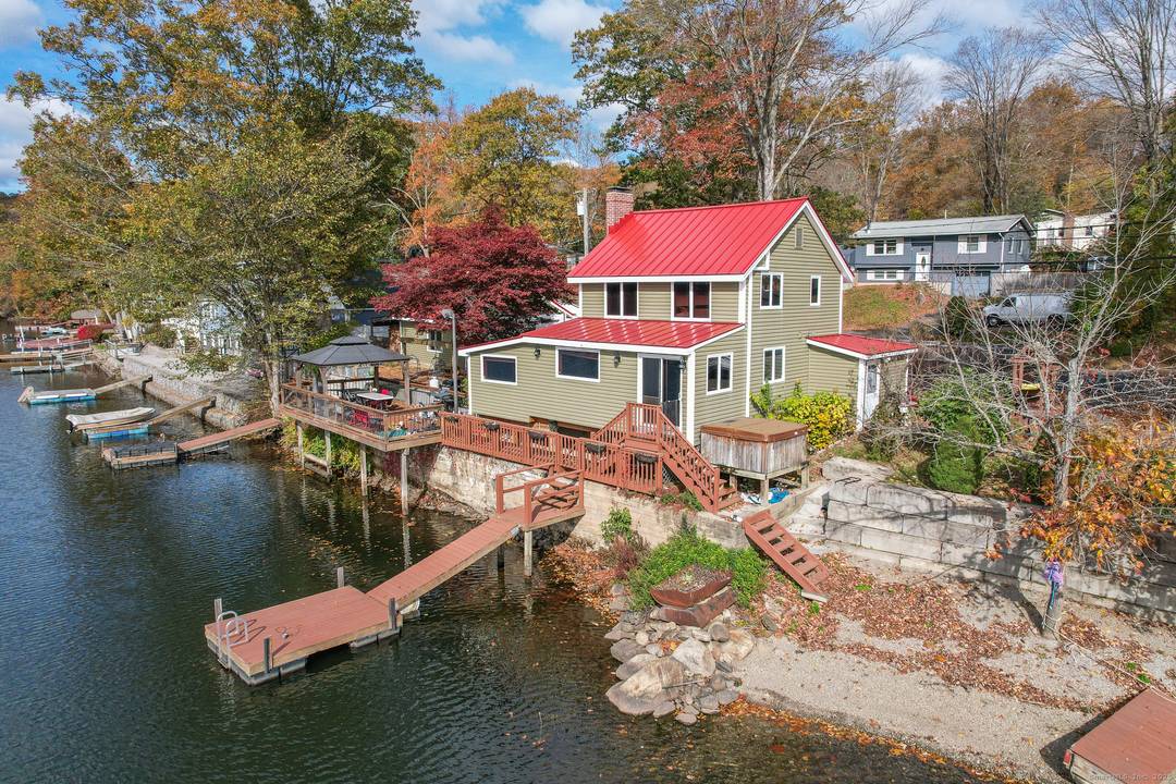 Stunning Direct Waterfront Home with Private Beach, Hot Tub Two Docks Experience the best of waterfront living in this beautifully updated 2 bedroom, 1.