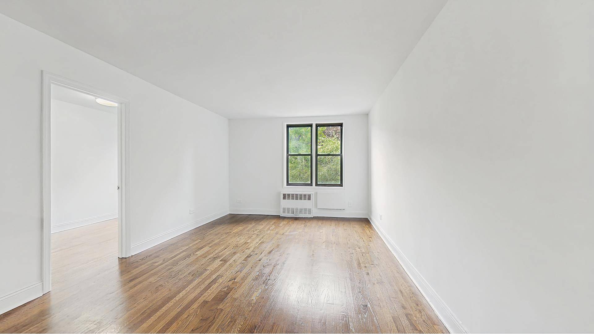 Welcome to an exceptional living experience at 599 East 7th Street, Unit 2B !