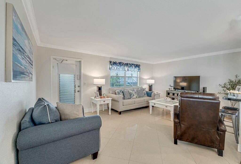 Welcome to this beautifully updated corner unit on 1st floor overlooking the golf course, located in a highly desirable 55 community that offers the perfect blend of comfort, convenience, and ...