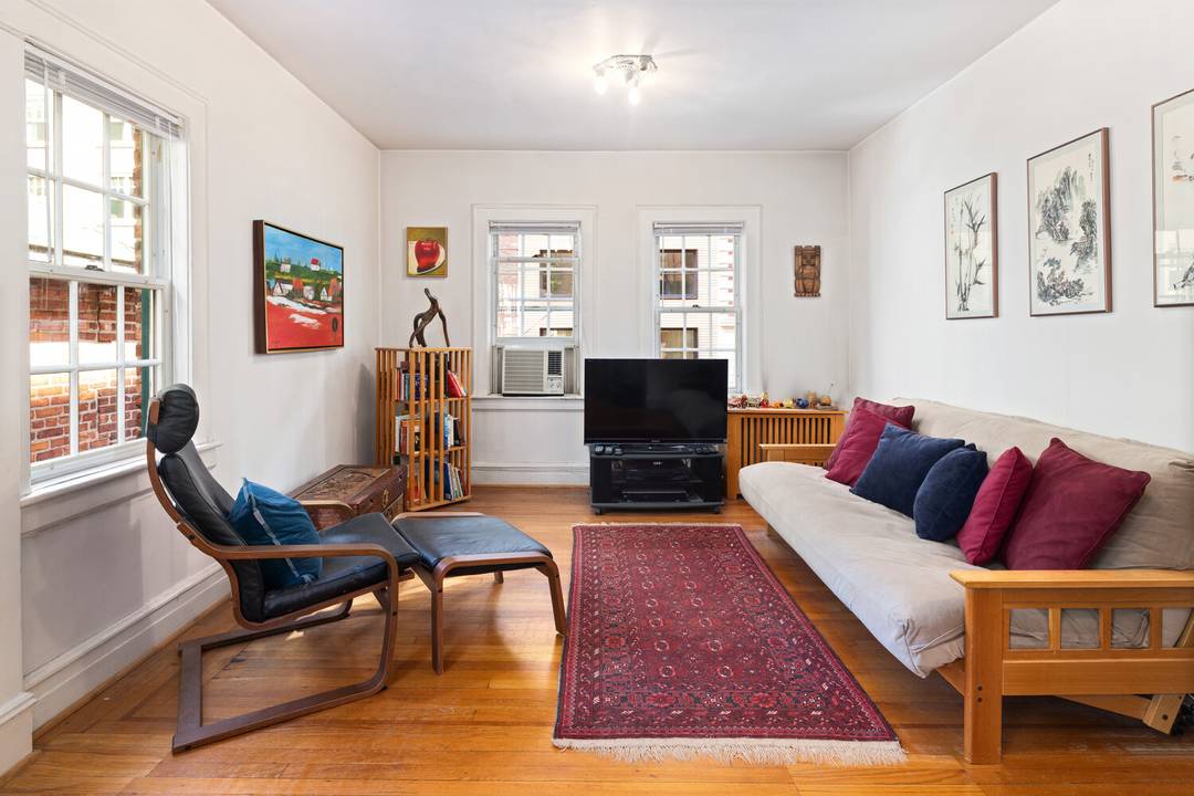 This third floor one bedroom offers a rare blend of historic charm, modern comfort, and storybook serenity in the heart of the Upper West Side in the historic Pomander Walk ...