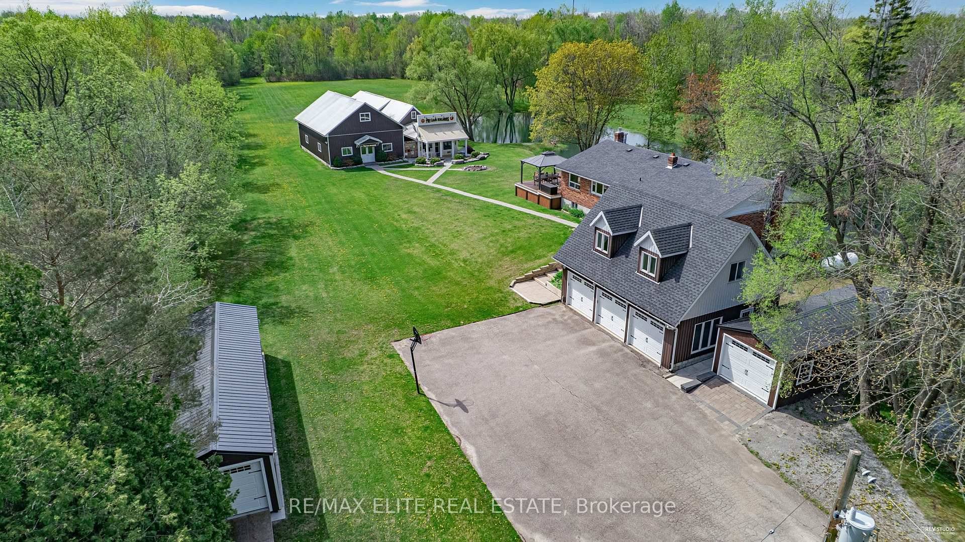 Incredible live work opportunity in a prime East Gwillimbury location on a beautifully private 12.