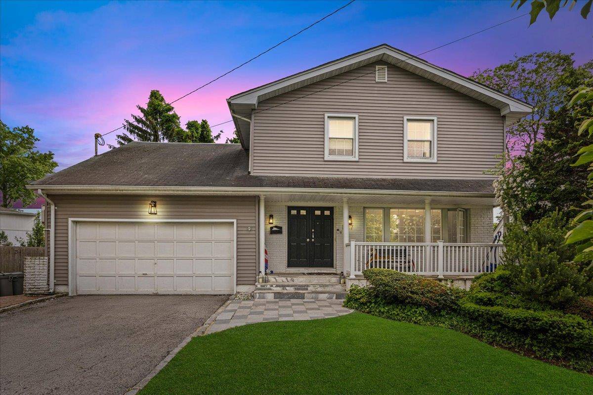 Discover this stunning Colonial home ideally located on a quiet cul de sac in the prestigious Saddle Ridge Estates, within the highly regarded Hewlett Woodmere School District.