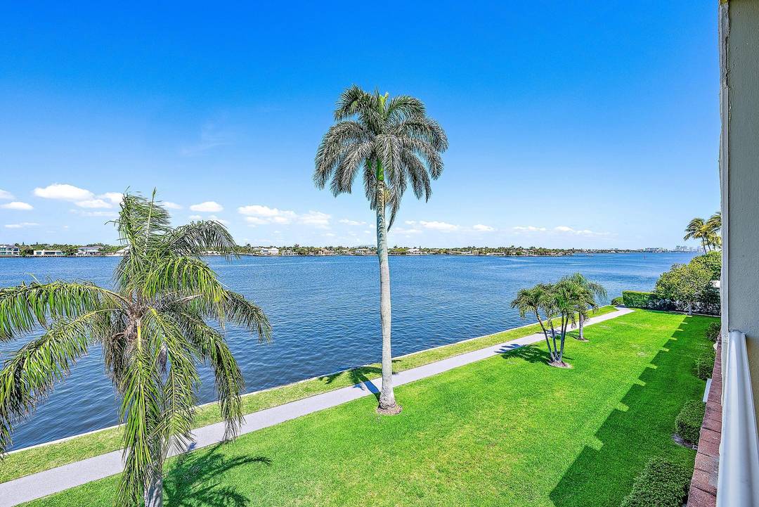 Enjoy spectacular direct Intracoastal views and stunning sunsets from this tastefully renovated Ibis Isle apartment with 9 ft ceilings and floor to ceiling sliders opening to a spacious terrace.